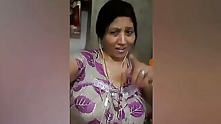 Desi auntie gets down and dirty with an anal teen.