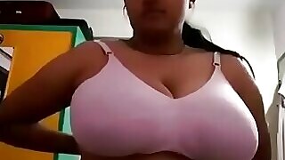Indian wife proudly displays her large breasts